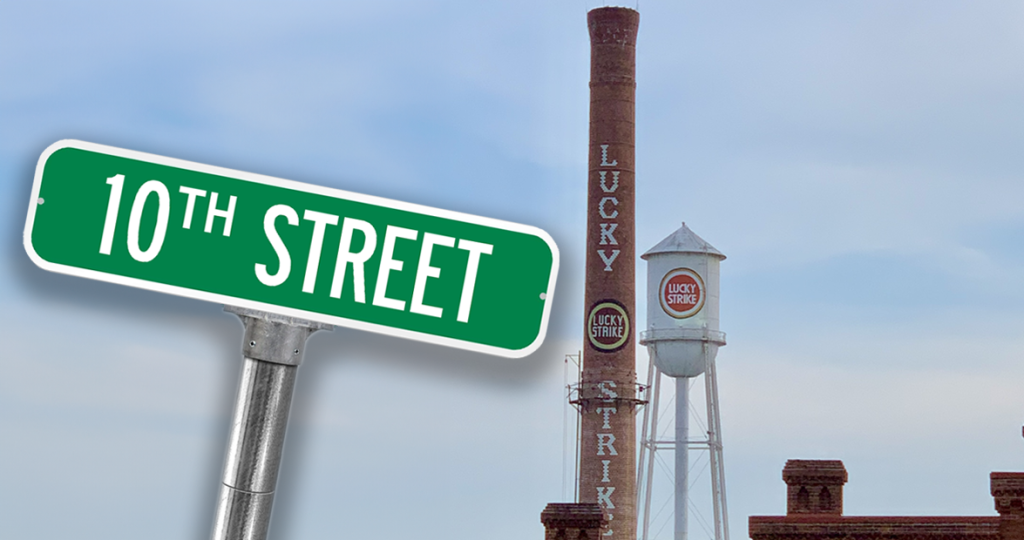 An image of a street sign that reads "10th Street" in front of the Lucky Strike tower in Durham.