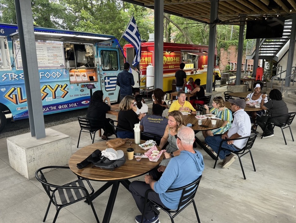 Customers at Can Opener, Durham's new food truck park 