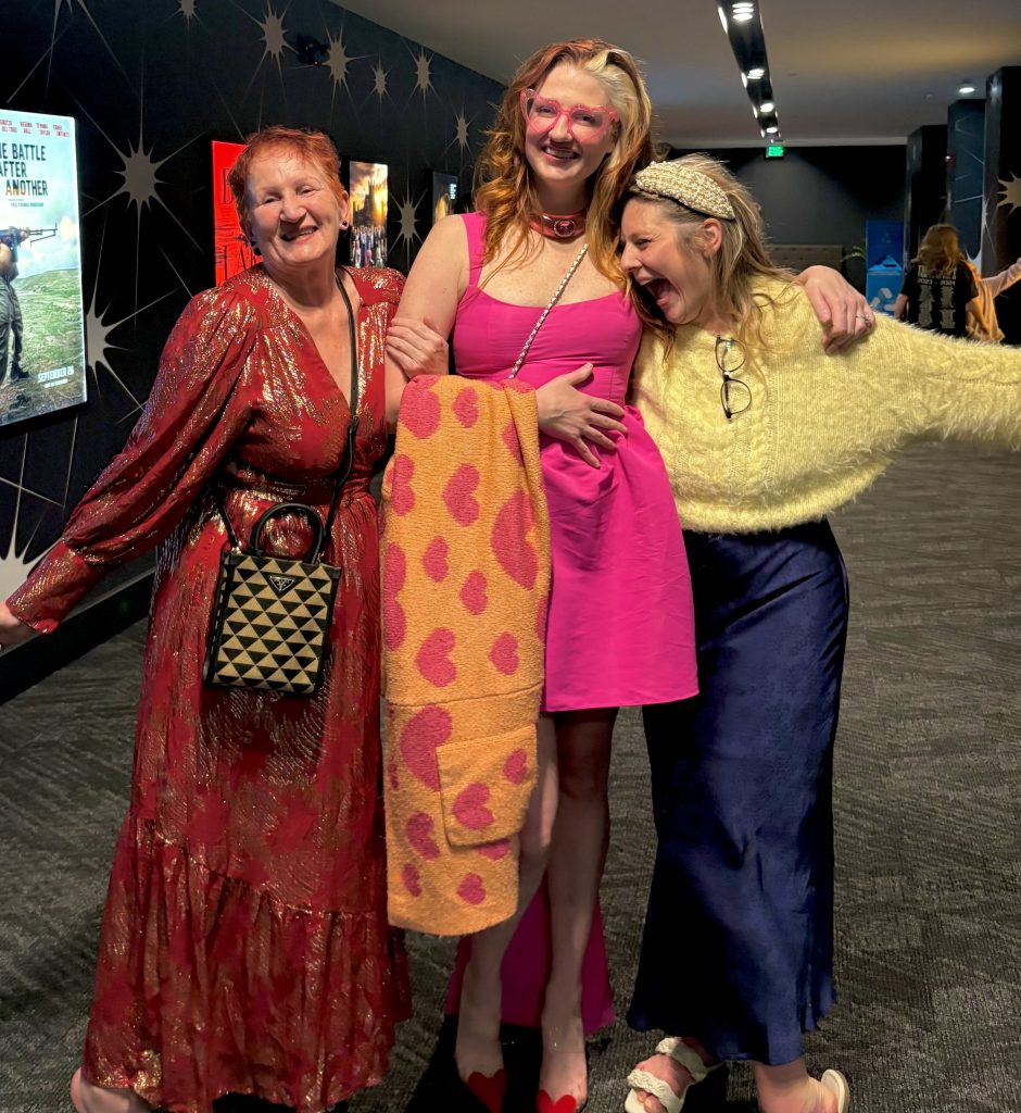Serena Kaylor, center, was dressed to the nines at the Friday premiere.